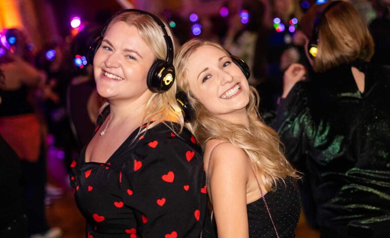 Locals being invited to experience a Silent Disco at Roman Baths